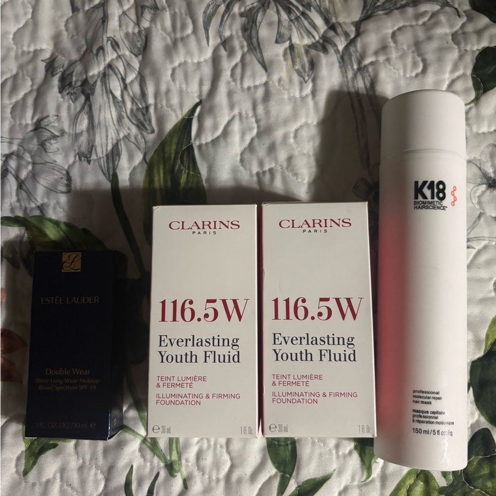 Foundation clarin and estee unused and k18 big bottle hair therapy.